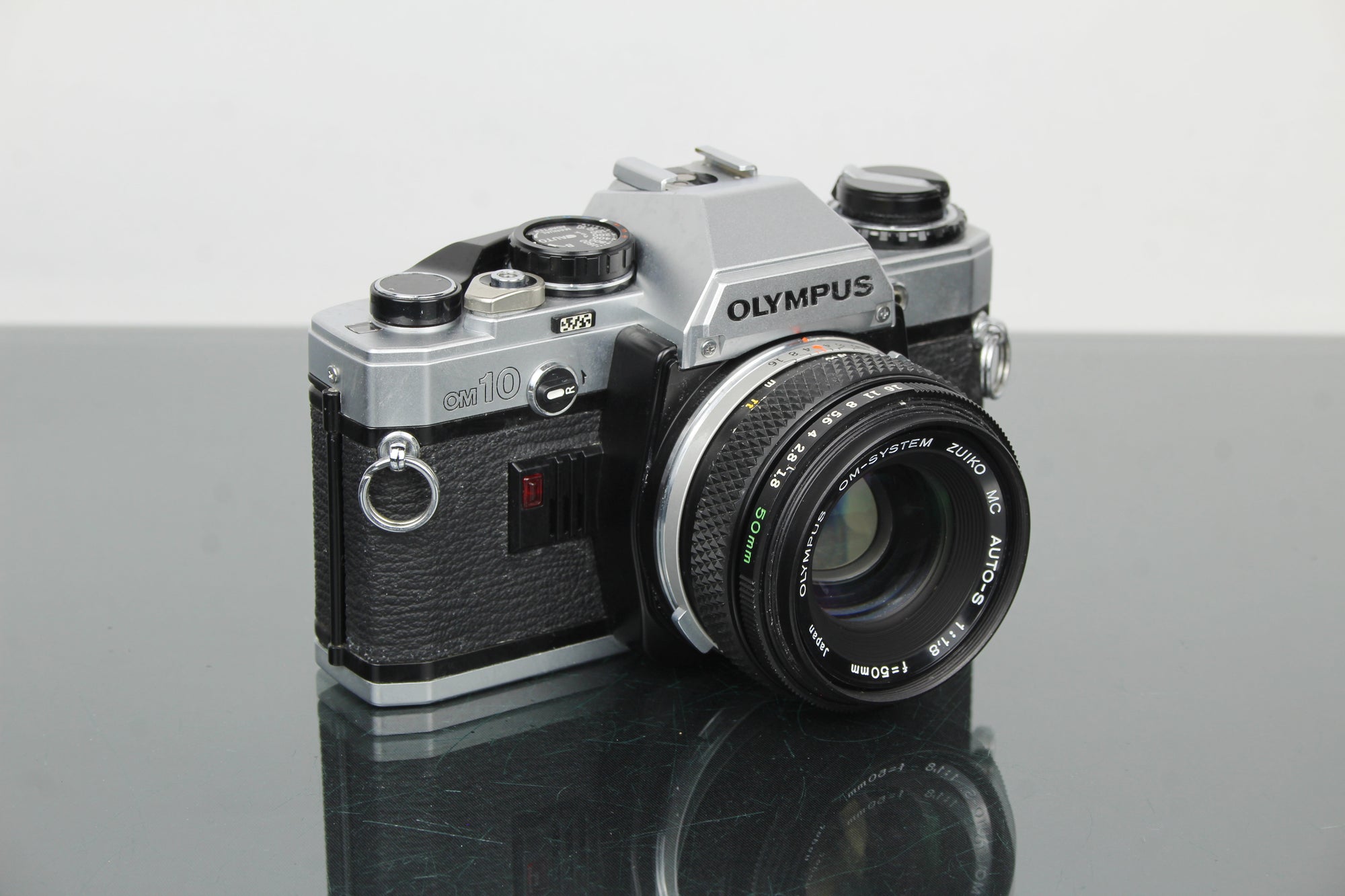 Olympus OM10 + lente OM Zuiko 50mm 1.8