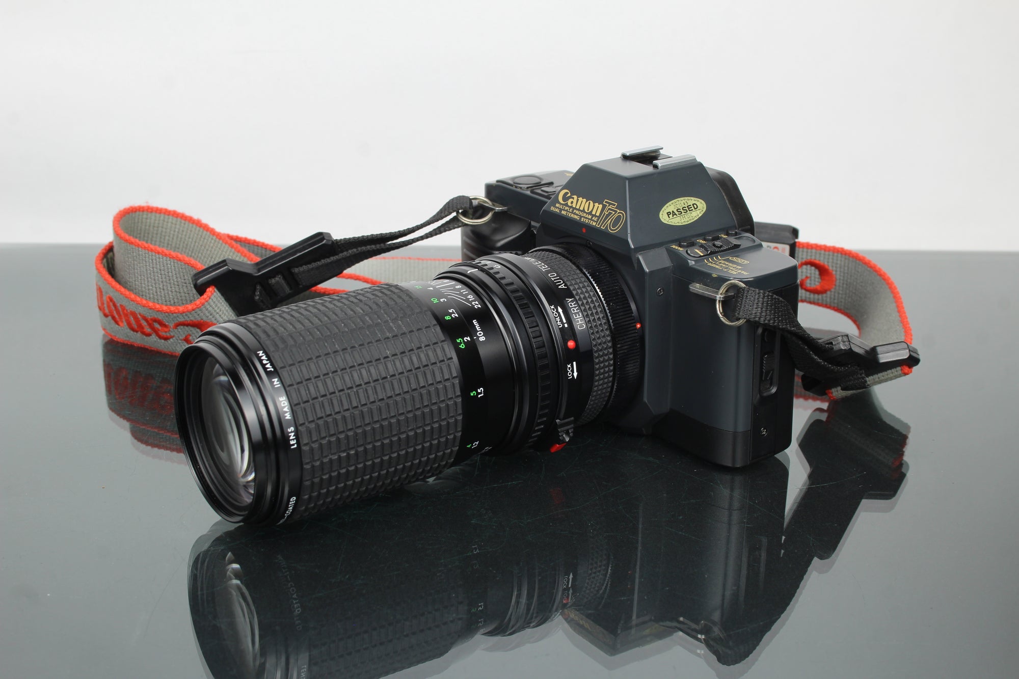 Canon T70 + lente Sigma 80-200mm f/4.5-5.6 FD