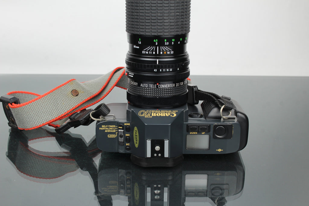 Canon T70 + lente Sigma 80-200mm f/4.5-5.6 FD
