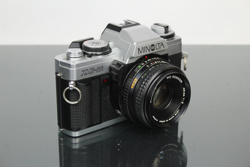 Minolta XG-M + lente Minolta MD Rokkor 45mm 1:2