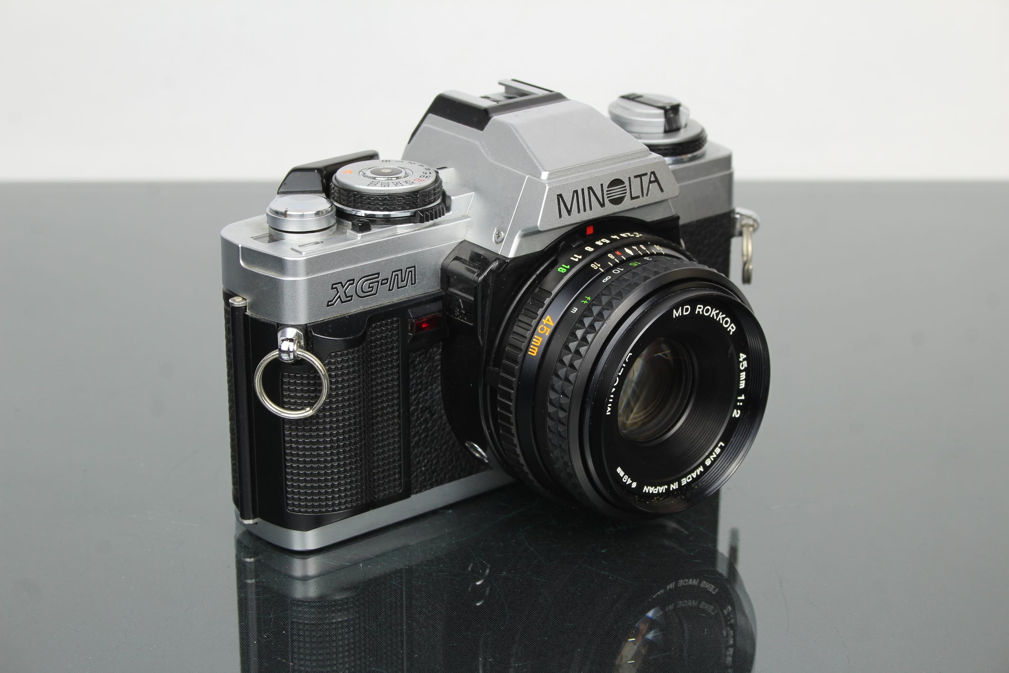 Minolta XG-M + lente Minolta MD Rokkor 45mm 1:2