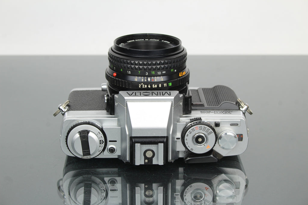 Minolta XG-M + lente Minolta MD Rokkor 45mm 1:2