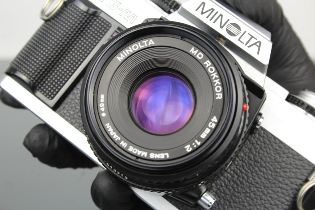 Minolta XG-M + lente Minolta MD Rokkor 45mm 1:2