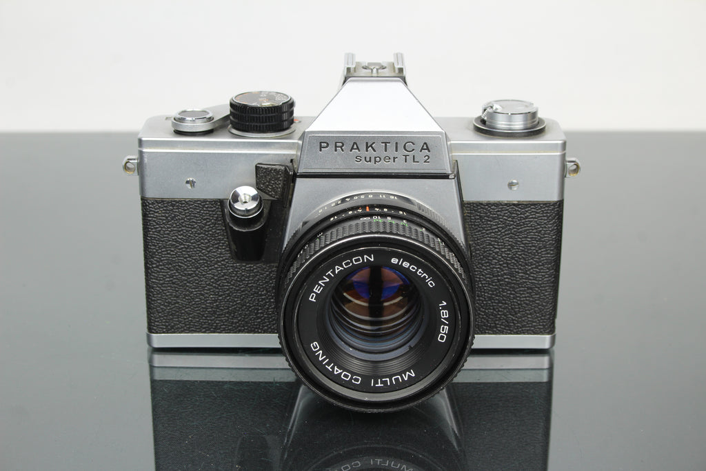 <tc>Praktica</tc> super TL2 + lente Pentacon eléctrica 50mm 1.8 M42