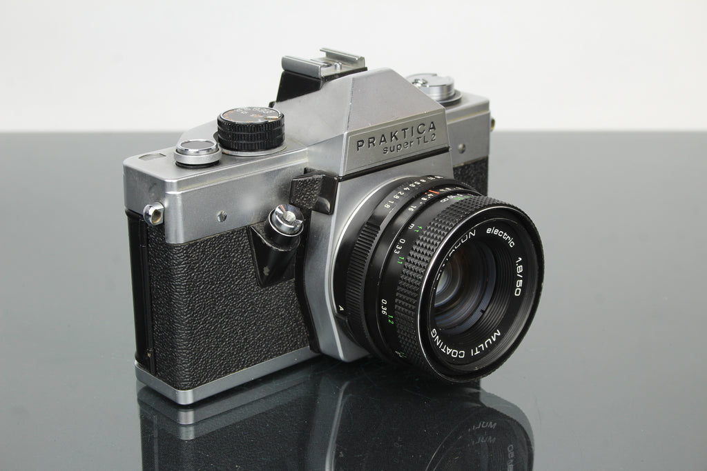<tc>Praktica</tc> super TL2 + lente Pentacon eléctrica 50mm 1.8 M42