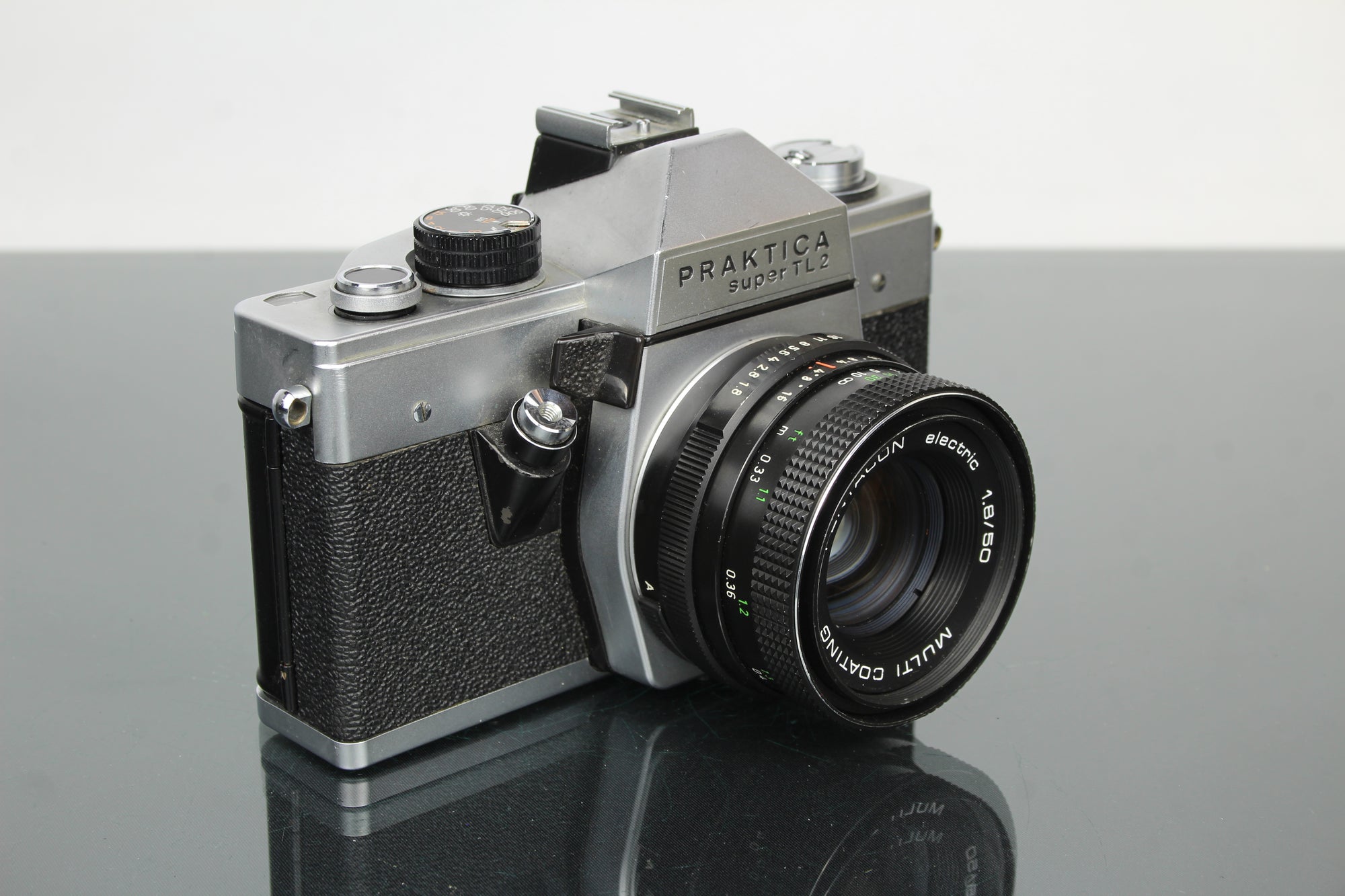 <tc>Praktica</tc> super TL2 + lente Pentacon eléctrica 50mm 1.8 M42