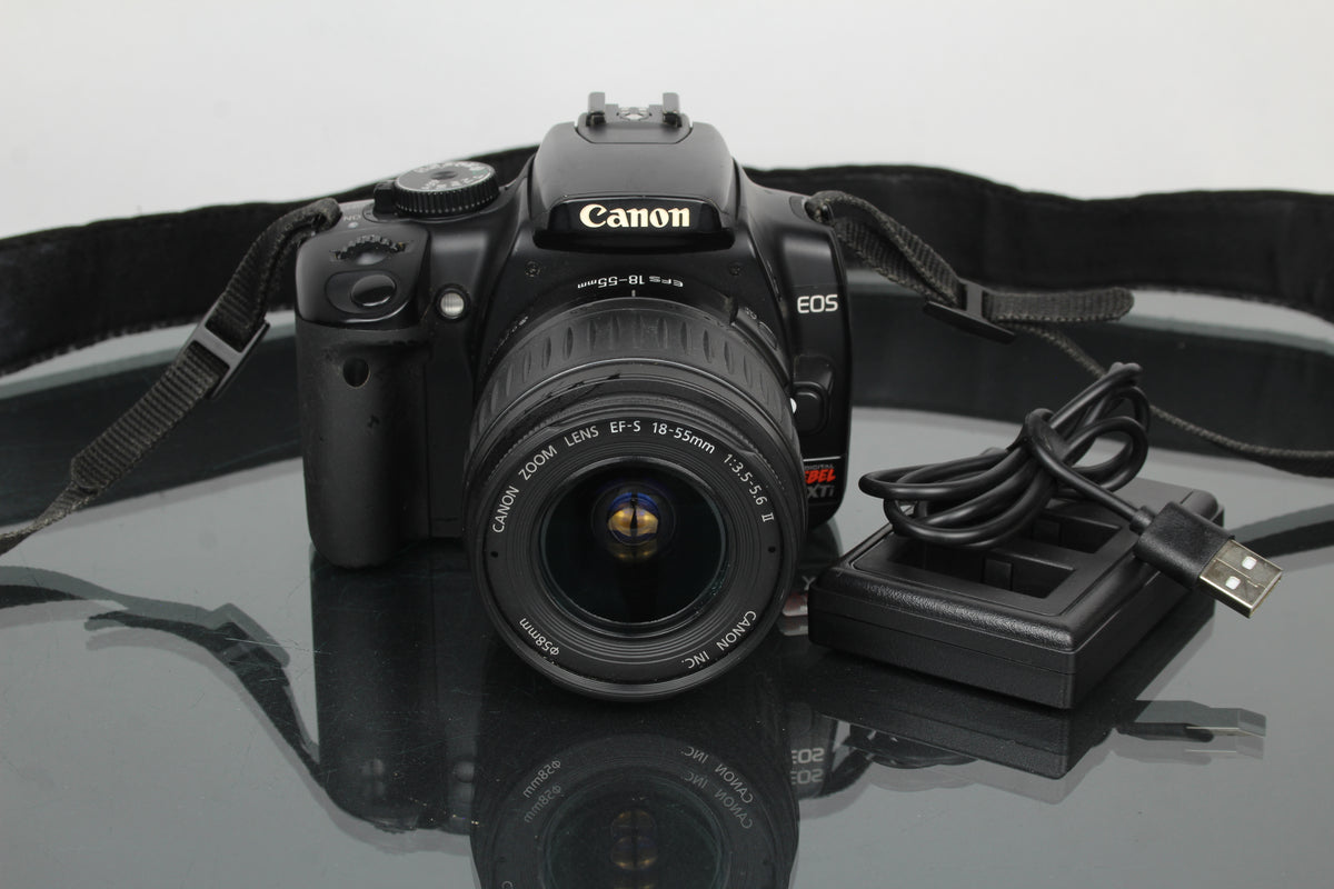 Canon EOS Rebel XTI + lente Canon EF-S 18-55mm 1:3.5-5.6