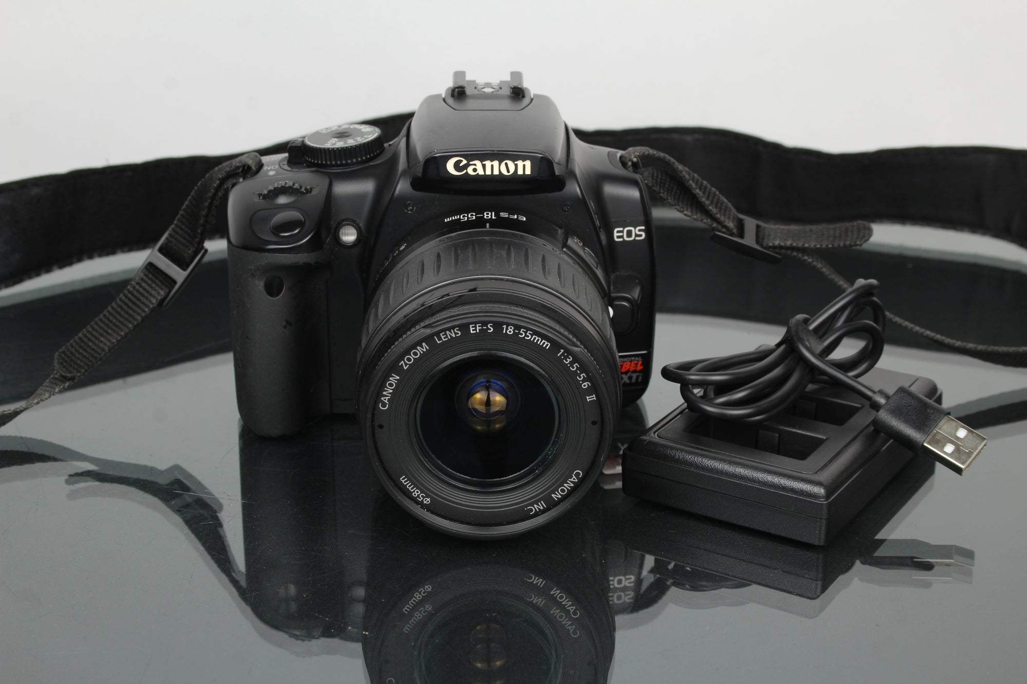 Canon EOS Rebel XTI + lente Canon EF-S 18-55mm 1:3.5-5.6