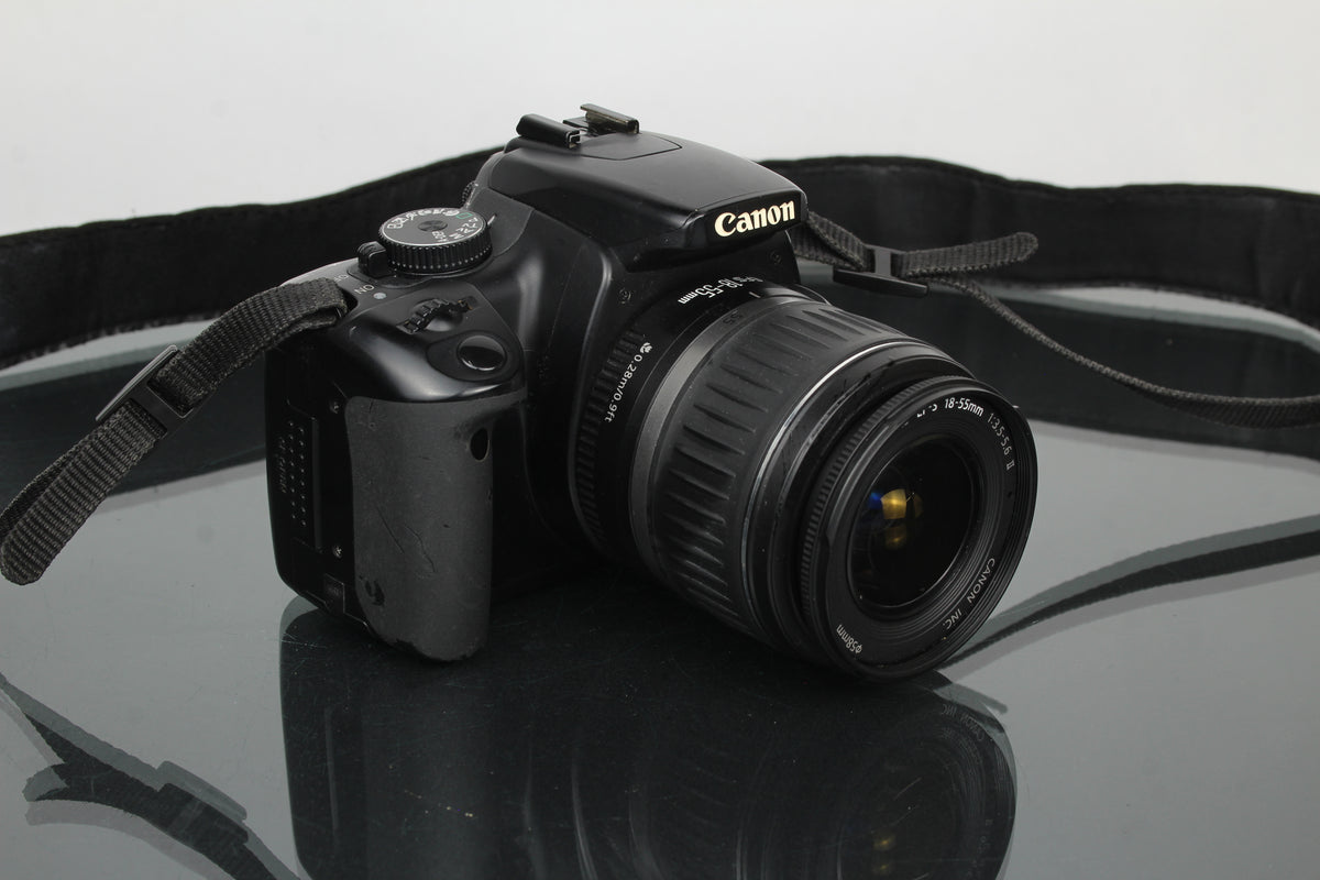 Canon EOS Rebel XTI + lente Canon EF-S 18-55mm 1:3.5-5.6
