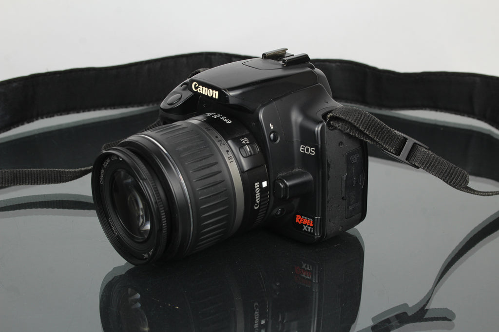 Canon EOS Rebel XTI + lente Canon EF-S 18-55mm 1:3.5-5.6