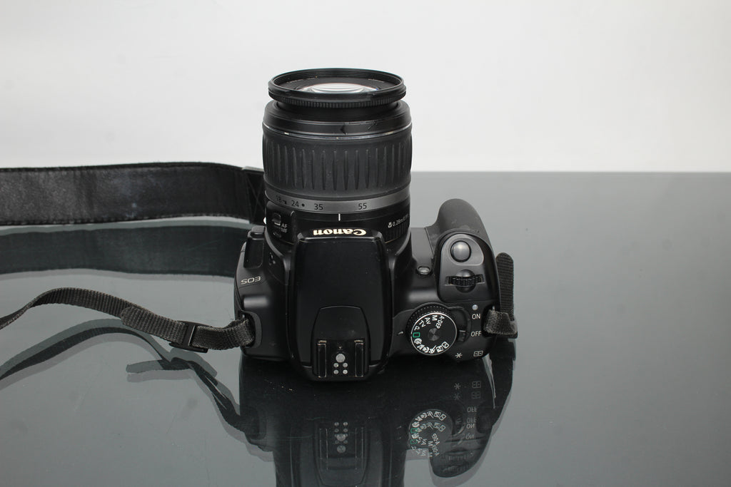 Canon EOS Rebel XTI + lente Canon EF-S 18-55mm 1:3.5-5.6