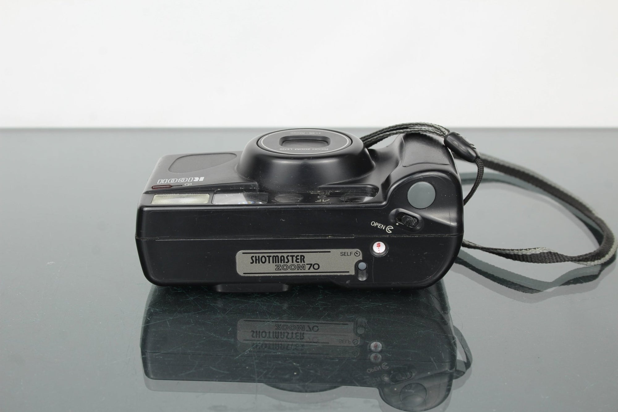Ricoh Shotmaster Zoom 70 - Dutch|Thrift